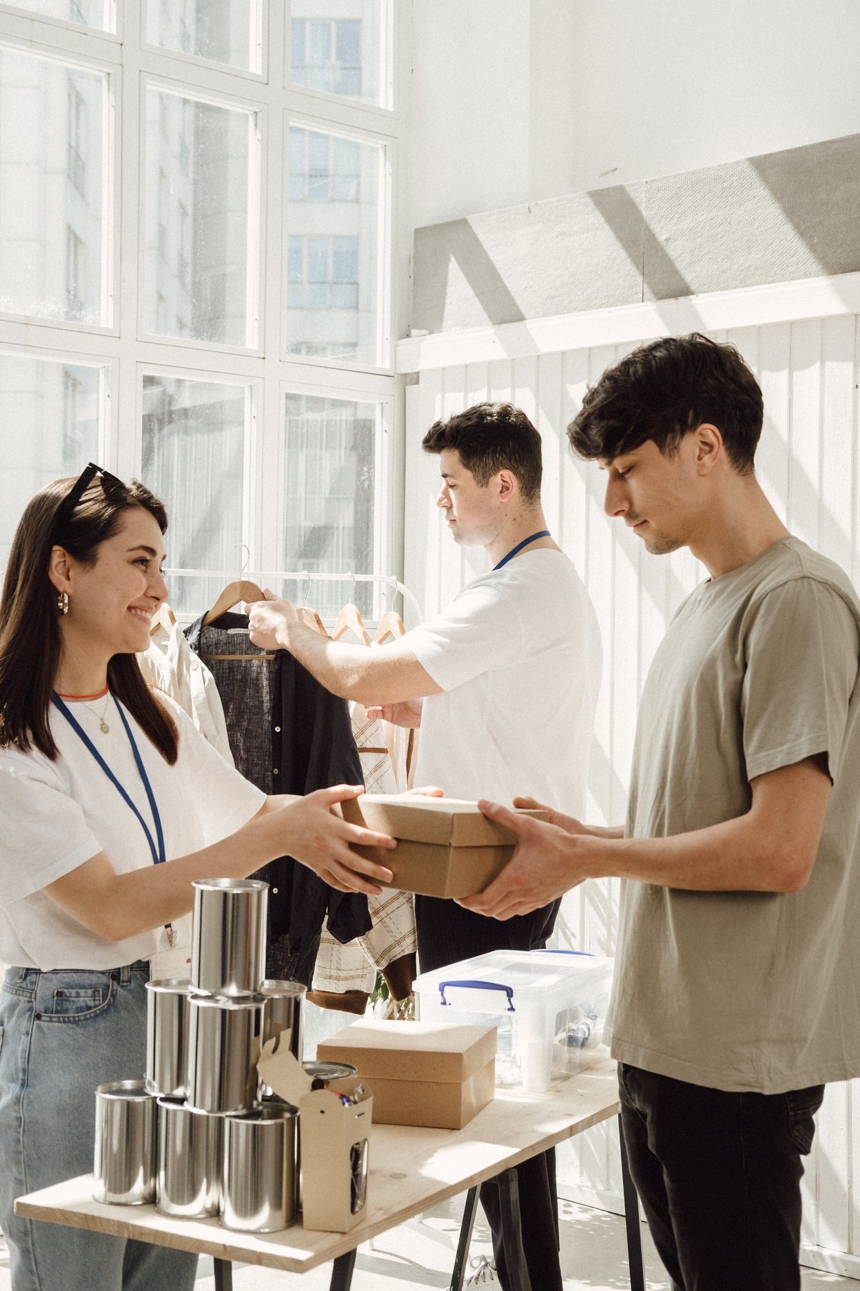 Volunteer Giving Food  to Man